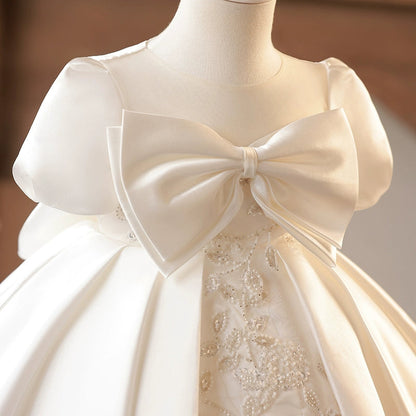 Cute Puffy White Satin Flower Girl Dress - Illusion Neckline, Sequins & Bow | Princess Tea Length Kids Gown